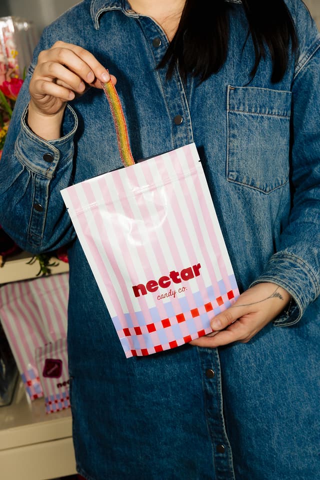 Swedish candy in hand